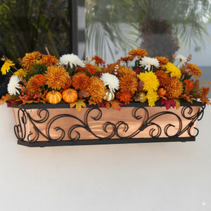 Regalia window box with copper liner mounted under window with autumn color flowers