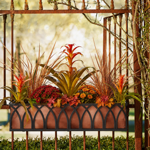 Arch Railing Planter with fall foliage installed on a railing
