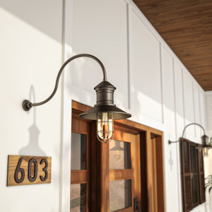 Gooseneck Barn Light on a home in bronze color Gooseneck Barn Light on a home in bronze color