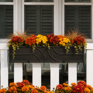 Falling Water Railing Planter on white railing planted with fall foliage