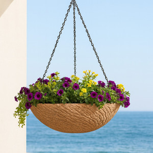 Roman Pond Fiberstone Hanging Basket hanging with ocean in background Roman Pond Fiberstone Hanging Basket hanging with ocean in background