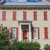 A colonial home with Stainless Steel L-Hinge New York Style Shutter Hardware A colonial home with Stainless Steel L-Hinge New York Style Shutter Hardware