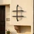 Faraday Wrought Iron Exterior Accent near a doorway