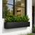 Black Modern Window Box under a window of a modern home