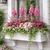 Laguna Cleat Mount Window Box shown with decorative faux brackets on a home.