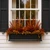 Black Fiberglass Laguna Window Box with fall foliage flower arrangement on a home with black shutters