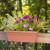 Terracotta countryside liner mounted to a rail