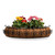 Parisian Half Moon Planter with a coco liner planted with colorful flowers
