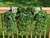 Outdoor Rated Artificial Green Vines and Bush Bundles for Window Boxes on a wood railing