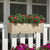 Jaadar fiberstone railing planter in Antigua finish with artificial azaleas