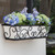 Regalia window box with white plastic liner mounted under window