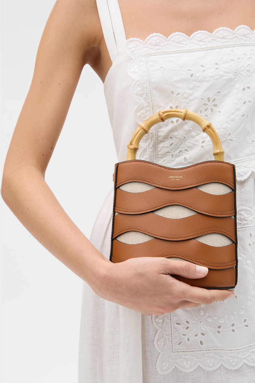 LEIGH RIC RAC BUCKET BAG - Amber | Oroton LEIGH RIC RAC BUCKET BAG - Amber | Oroton