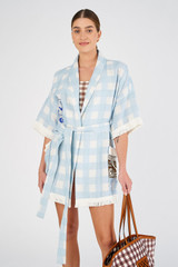 Profile view of model wearing the Oroton Patched Gingham Robe in Pale Blue and 100% linen for Women