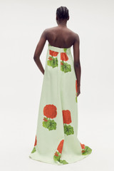 Profile view of model wearing the Oroton Posie Geranium Print Gown in Sea Spray and 100% linen for Women .