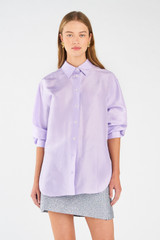 Profile view of model wearing the Oroton Silk Long Sleeve Shirt in Lilac and 100% silk for Women