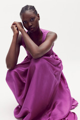 Profile view of model wearing the Oroton Strappy Sundress in Magenta and 100% silk for Women