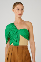 Profile view of model wearing the Oroton Blocked Drape Bodice in Jewel Green and 77% cotton, 23% linen & 100% recycled polyester for Women