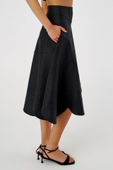 Profile view of model wearing the Oroton Scallop Midi Skirt in Black and 100% Linen for Women