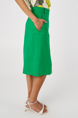 Profile view of model wearing the Oroton A-Line Skirt in Jewel Green and 58% viscose 42% linen for Women