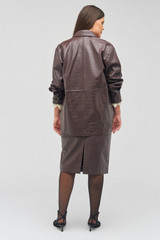 Profile view of model wearing the Oroton Embossed Croc Long Sleeve Overshirt in Burgundy and 100% leather for Women .