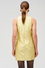 Profile view of model wearing the Oroton Bow Detail Shift Dress in Lemon Zest and 85% polyester, 15% silk for Women .