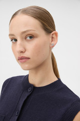 Profile view of model wearing the  Leah Stud Earrings in Silver and Stainless Steel for Women .