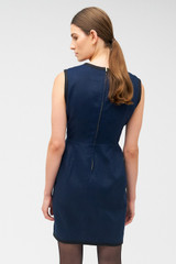 Profile view of model wearing the Oroton Contrast Bind Shift Dress in North Sea and 100% linen for Women