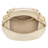 Internal product shot of the Oroton Mica Mini Bowler

 in Cashew and Pebble leather for Women