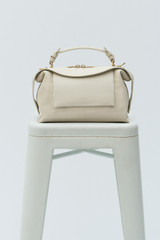 Detail product shot of the Oroton Mica Bowler in Cashew and Embossed leather with smooth leather trims for Women .