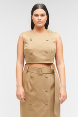Profile view of model wearing the Oroton Sleeveless Utility Top in Dark Camel and 65% polyester, 35% cotton for Women