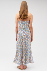 Profile view of model wearing the Oroton Zig Zag Flower Stamp Slip Dress in Folk Blue and 100% silk for Women