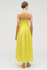 Profile view of model wearing the Oroton Lace Trim Sundress in Vibrant Yellow and 100% cotton for Women .