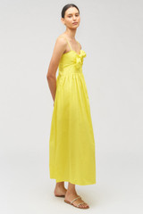 Profile view of model wearing the Oroton Lace Trim Sundress in Vibrant Yellow and 100% cotton for Women .