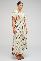 Profile view of model wearing the Oroton Vintage Ribbon Print Dress in Multi and 100% silk fabric for Women .