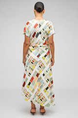 Profile view of model wearing the Oroton Vintage Ribbon Print Dress in Multi and 100% silk fabric for Women .