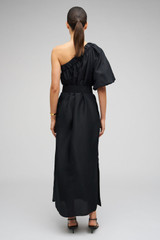 Profile view of model wearing the Oroton One Shoulder Dress in Black and 100% Silk for Women