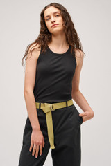 Profile view of model wearing the Oroton Lottie Rib Tank in Black and 92% Cotton / 8% Spandex for Women .