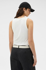 Profile view of model wearing the Oroton Lottie Rib Tank in Antique White and 92% Cotton / 8% Spandex for Women .