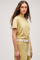Profile view of model wearing the Oroton Maggie Classic Tee in Wheat and 100% cotton fabric for Women .