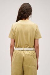 Profile view of model wearing the Oroton Maggie Classic Tee in Wheat and 100% cotton fabric for Women .