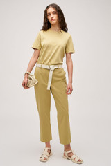 Profile view of model wearing the Oroton Arlo Carpenter Chino in Wheat and 100% cotton fabric for Women .