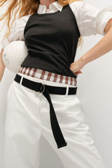 Profile view of model wearing the Oroton Quinn Webbing Belt in Black and 100% cotton material for Women . IP:2