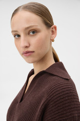 Profile view of model wearing the Oroton Ellie Crystal Round Huggie in Gold/Crystal and Brass hardware for Women .