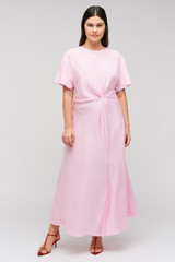 Profile view of model wearing the Oroton Drape Front Dress in Pink Rose and 92% Silk 8% Spandex for Women .