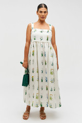 Profile view of model wearing the Oroton Greenhouse Floral Sundress in Mist and 100% Linen for Women .