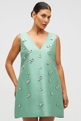Profile view of model wearing the Oroton Embellished Shift Dress in Mint Leaf and 100% heavy weight linen fabric for Women .
