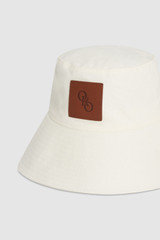 Detail product shot of the Oroton Nell Bucket Hat in Antique White and 100% cotton canvas fabric for Women .