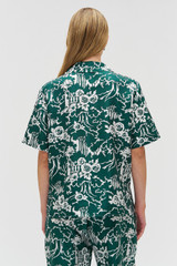 Profile view of model wearing the Oroton Garden Toile Embellished Camp Shirt in Ivy and 100% silk for Women .