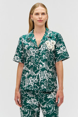 Profile view of model wearing the Oroton Garden Toile Embellished Camp Shirt in Ivy and 100% silk for Women .