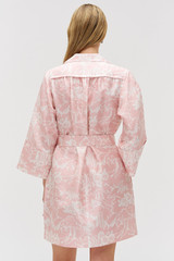 Profile view of model wearing the Oroton Garden Toile Embellished Tunic Dress in Peony and 100% silk for Women .